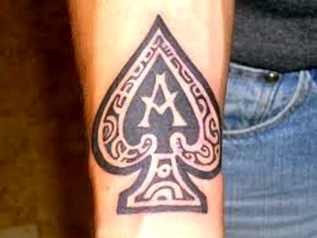 Тату крестовый туз значение